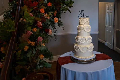 Four tier white buttercream wedding cake